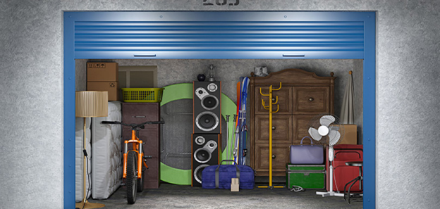 Organized self storage unit with boxes and furniture